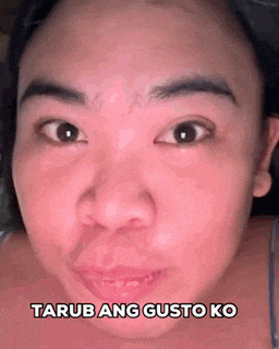 a close up of a woman 's face with the words tarub ang gusto ko written on the bottom .