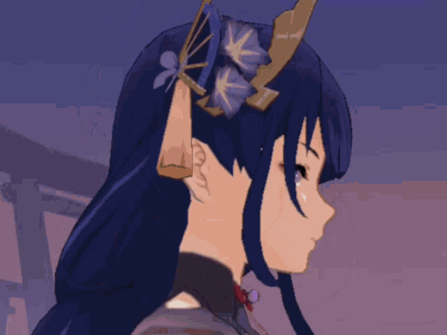a close up of a girl with purple eyes and dark hair