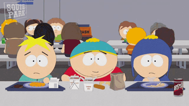 three south park characters sitting at a table