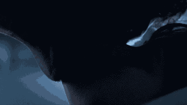 a pixelated image of a woman in bed