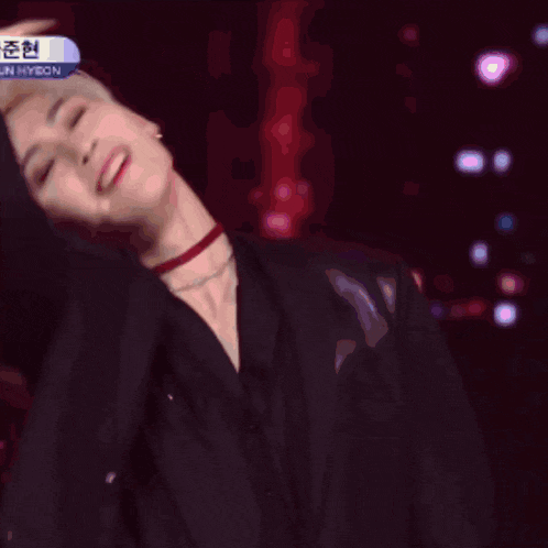 a blurry image of a person with the name jin ryeon on the bottom