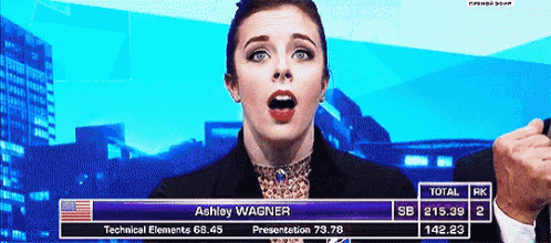 a woman named ashley wagner is talking on a television screen