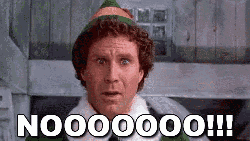 a close up of a man in an elf costume making a funny face and saying nooooo !
