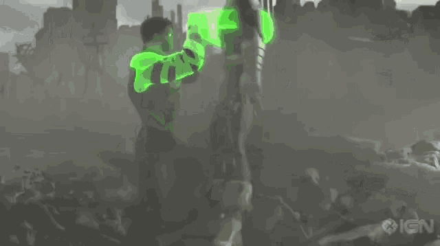 a man in a green lantern costume is kneeling down next to another man