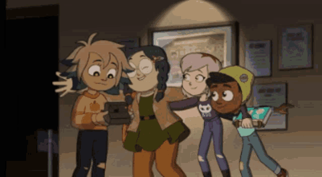 a group of cartoon characters are posing for a picture and one of them has a shirt with the letter b on it