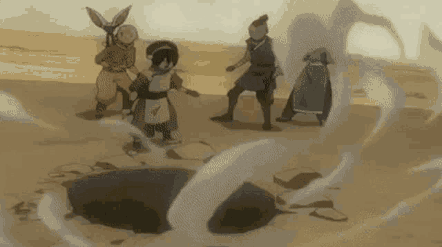 a group of people are standing around a rock in the desert .