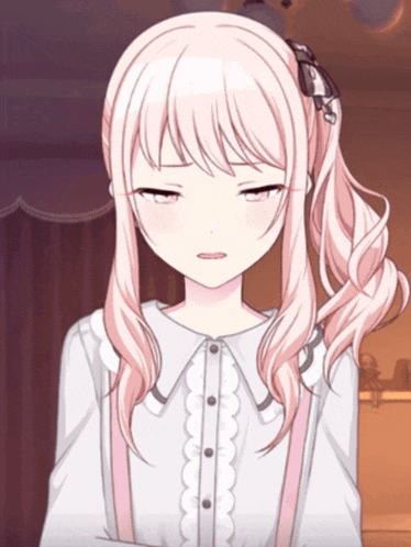 a girl with pink hair is making a funny face with her eyes closed