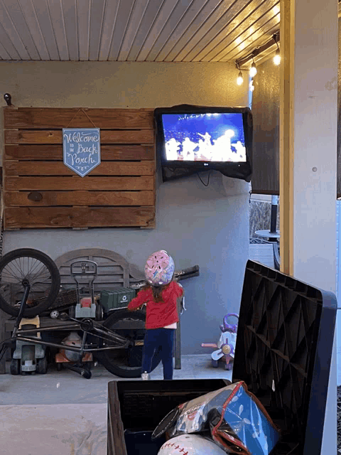 a sign that says welcome to back touch hangs on a wall