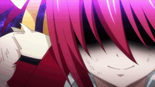 a close up of a girl with red hair