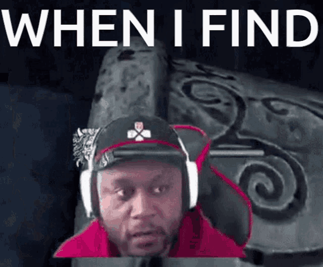 a man wearing headphones and a hat with the words when i find below him