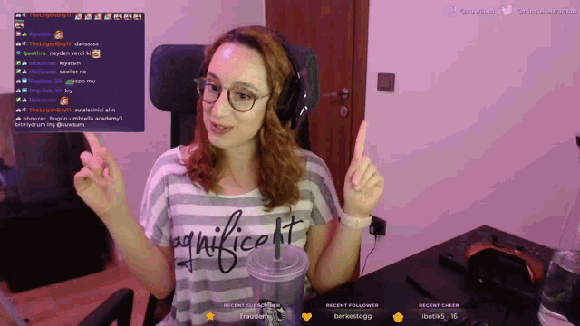 a woman wearing headphones and a shirt that says significant points up