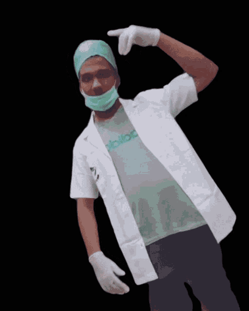 a man wearing a lab coat and a shirt that says adidas on it