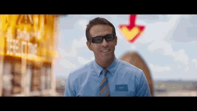 a man with a name tag that says guy