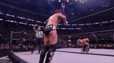 a man in a wrestling ring with the word fite on the bottom right