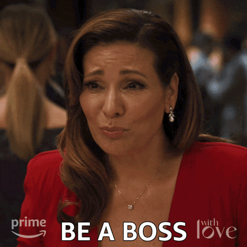 a woman in a red dress with the words be a boss on the bottom