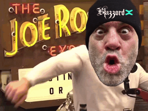 a man wearing a beanie that says blazzard on it