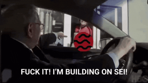 a man driving a car with the words fuck it i 'm building on sei