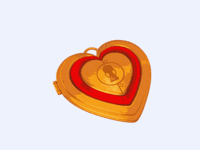 a heart shaped locket with the word whore on the inside