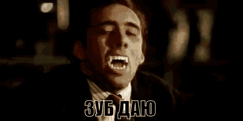 a close up of a man 's face with a foreign language on it .