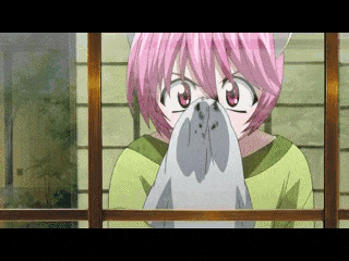 a girl with pink hair is blowing her nose while looking out a window .
