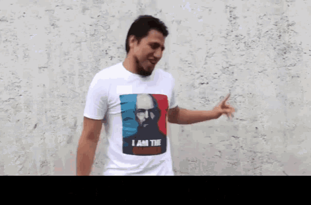 a man wearing a shirt that says i am the chairman