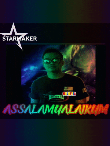 a man wearing sunglasses and a black shirt is standing in front of a starmaker logo