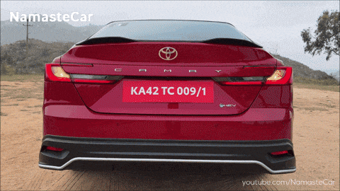 a red car with a license plate that says ka42tc 009/1