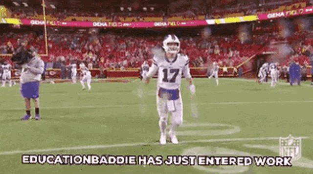a football player is running on a field with the words `` educationbaddie has just entered work '' written below him .