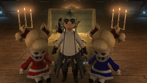 two dolls are standing in front of a treasure chest