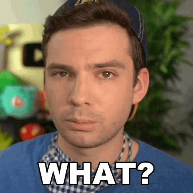 a man wearing a baseball cap and a blue shirt says what