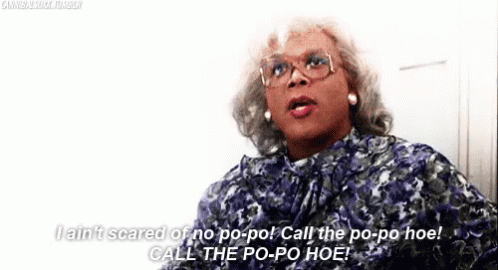 I Ain'T Scared Of No Popo! Call The Popo Hoe! GIF - Police Cop Office GIFs