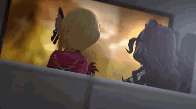 a couple of anime characters looking at a tv screen