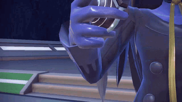 a close up of a person 's hand holding a sword