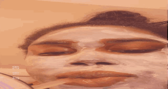 a woman wearing a face mask has the date 21 10 20 on the bottom right