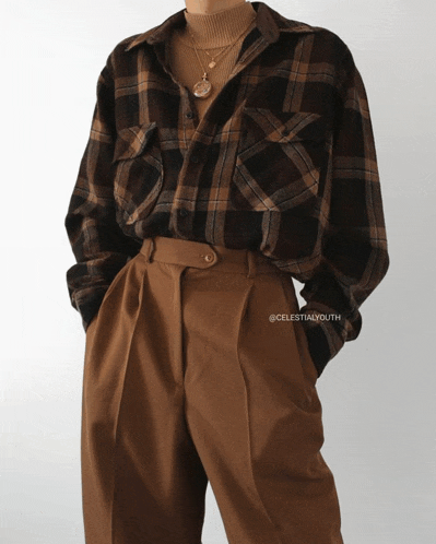 a woman wearing a plaid shirt and brown pants is sponsored by celestialyouth