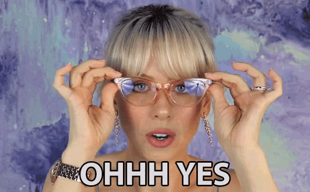 a woman wearing glasses says ohh yes