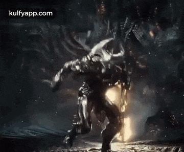 a monster with horns is walking through a dark room in a video game .