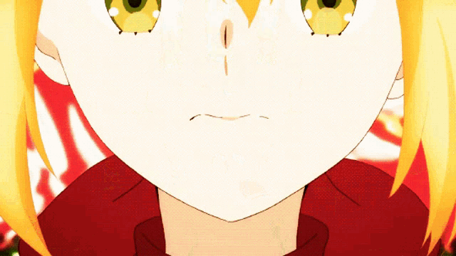 a close up of a person 's face with yellow hair
