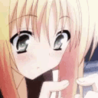 a close up of a girl with blonde hair and green eyes holding a pencil in her hand .