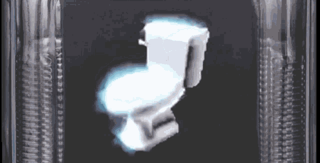 a toilet with a light coming out of it