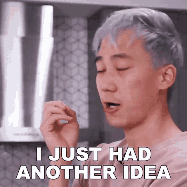 a man with gray hair is making a funny face and saying i just had another idea