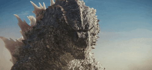 a close up of a monster with spikes on its head