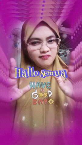 a woman wearing glasses and a hijab with the words hallo semua have a good day above her