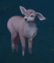 a pink and white deer with wings is standing in the grass .