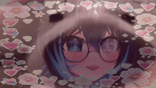 a picture of a girl wearing glasses and a panda hat