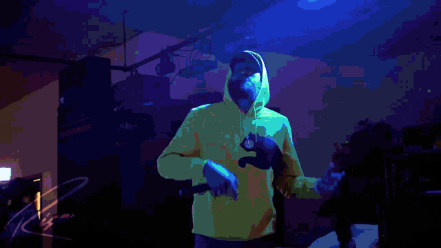a pixelated image of a man in a yellow hoodie dancing