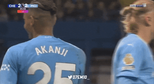 a soccer player with the number 25 on his shirt