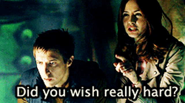 a man and a woman are standing next to each other with the words did you wish really hard on the bottom