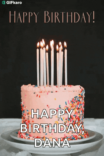 a birthday cake with candles and sprinkles and the name dana on it