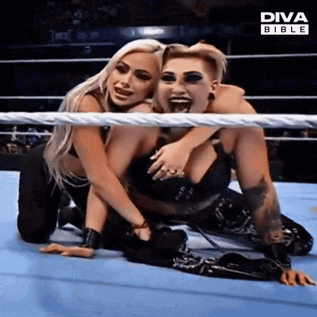 two women are wrestling in a diva bible wrestling ring